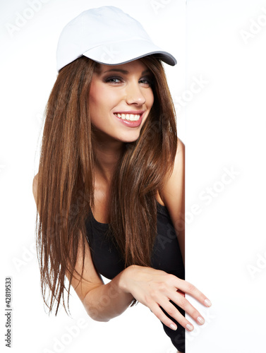Foto: Beautiful woman holding empty white board Beautiful woman holding empty white board