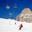 Skiers on a piste