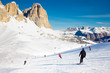 Skiers on a Piste