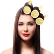 Photo: Beautiful brunnete with lemons in her hairstyle Beautiful brunnete with lemons in her hairstyle