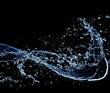 Foto: Water splash, isolated on black background Water splash, isolated on black background