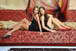 Photo: Two beautiful women in luxury interior. Two beautiful women in luxury interior.