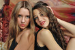 Photo: Portrait of a two beautiful women in luxury interior. Portrait of a two beautiful women in luxury interior.