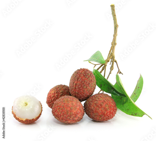 Photo: Fresh lychees on white Fresh lychees on white
