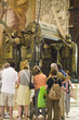 Photo: Tourists look at the mausoleum-monument and ornate tomb of Christopher Columbus where four heralds dressed in full court mourning carry the sarcophagus; they bear respectively the arms of, Castile, LŽon, Aragon, and Navarre, the four nations which united under the rule of Ferdinand and Isabella, constituted the kingdom of Spain. The sarcophagus is of bronze, ornamented with enameled metallic plates, and in it are the remains of Columbus, the Discoverer of the New World and America in October of 1492. Sevilla Cathedral, Southern Spain. Tourists look at the mausoleum-monument and ornate tomb of Christopher Columbus where four heralds dressed in full court mourning carry the sarcophagus; they bear respectively the arms of, Castile, LŽon, Aragon, and Navarre, the four nations which united under the rule of Ferdinand and Isabella, constituted the kingdom of Spain. The sarcophagus is of bronze, ornamented with enameled metallic plates, and in it are the remains of Columbus, the Discoverer of the New World and America in October of 1492. Sevilla Cathedral, Southern Spain.