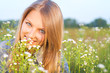 Smiling Girl outdoors. Meadow
