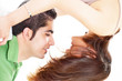 Photo: Couple love fun in yin yang pose about to kiss Couple love fun in yin yang pose about to kiss