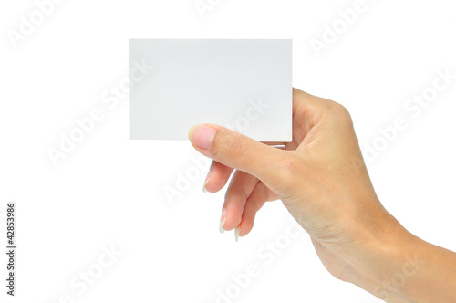 Photo: Blank card in a hand Blank card in a hand