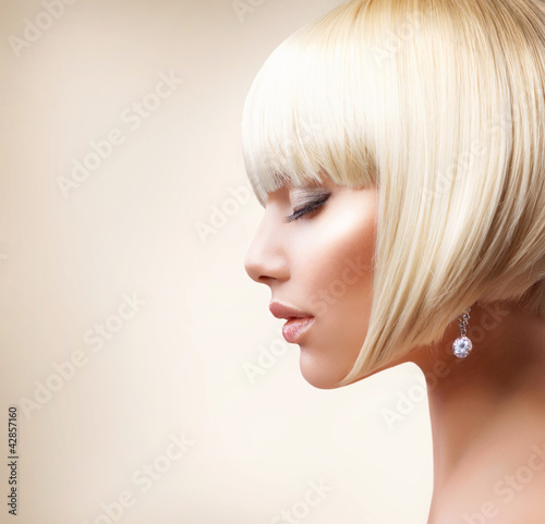Photo: Blond Hair. Beautiful Girl with Healthy Short Hair Blond Hair. Beautiful Girl with Healthy Short Hair