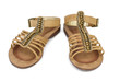 Pair of brown leather female sandals