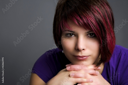 Photo: close-up portrait of a beautiful young lady close-up portrait of a beautiful young lady