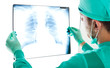 Doctor looking at x-ray