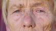Wrinkled face of old woman