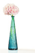 Foto: Pink peony flowers in blue vase over white Pink peony flowers in blue vase over white