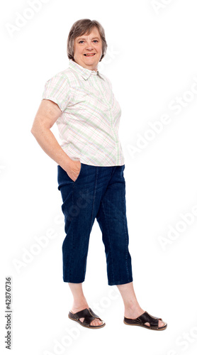 Photo: Old lady posing with hands in pocket Old lady posing with hands in pocket
