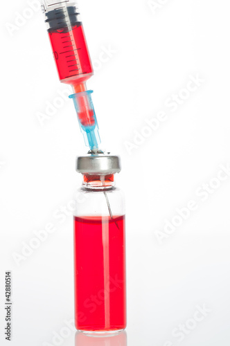 Photo: medicine vials and syringe medicine vials and syringe