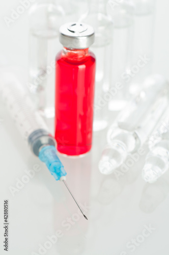 Photo: medicine vials and syringe medicine vials and syringe