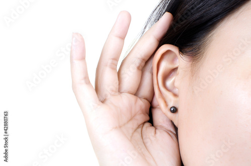 Photo: Woman listening. Woman listening.