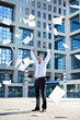 Photo: Businessman throwing paperwork Businessman throwing paperwork