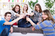 Foto: Group of teenagers on private party Group of teenagers on private party