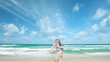 Young woman posing on the beach