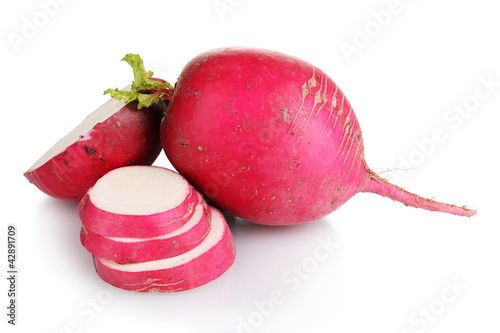 Photo: Fresh slised and whole radish isolated on white Fresh slised and whole radish isolated on white
