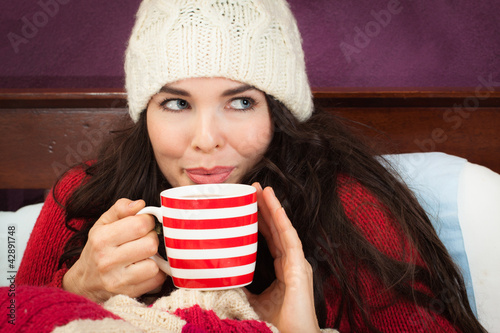 Photo: Beautiful woman having hot drink Beautiful woman having hot drink