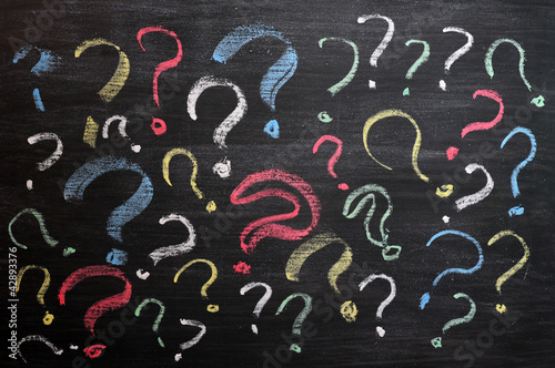 Photo: Question marks on chalkboard Question marks on chalkboard