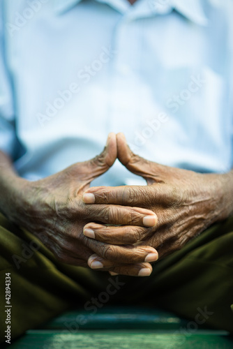 Фото: pensive old man sitting on bench in park pensive old man sitting on bench in park