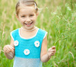 Cute little girl  on the meadow