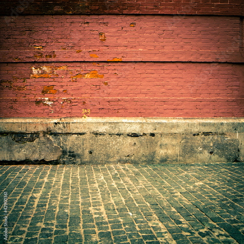 Photo: old grunge interior with brick wall old grunge interior with brick wall