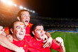Football Supporters Watching a Match