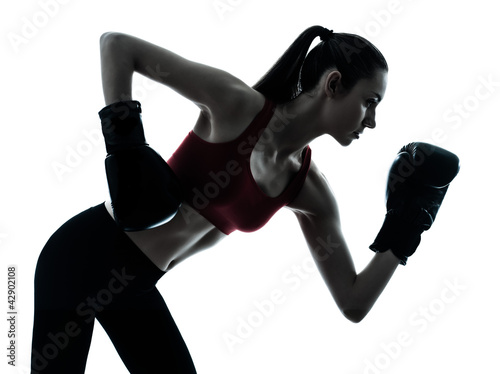 Photo: beautiful woman exercising boxe beautiful woman exercising boxe
