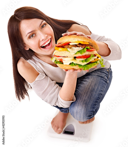Foto: Girl weight loss on scales Girl weight loss on scales