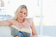 Housewife turning the pages of a book 