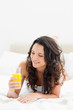 Attractive brunette with a fruit juice