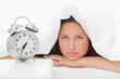 Alarm clock with a woman sulking 