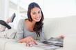 Portrait of a student leafing through a magazine