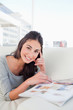Portrait of a beaming student with a magazine
