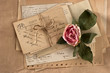 Photo: dry rose and old letters. vintage postcards dry rose and old letters. vintage postcards