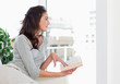 Brunette holding a novel