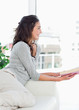 Brunette holding a book