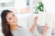 Portrait of a brunette enjoying a book