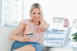 Blonde approving the shopping online