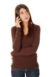 Young beautiful woman is talking by phone.