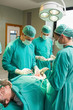 Female patient lying on operating table
