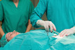 Close up of a surgeon using a surgical tool