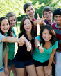 Ethnic Group of happy teenage friends outside