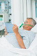 Male patient wearing an oxygen mask