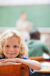 Schoolboy not paying attention to teacher